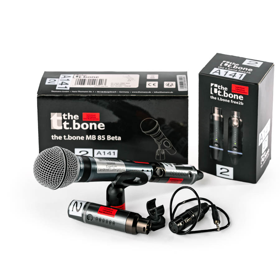 Dynamisches Mikrofon mit Halterung, zwei Funkmikrofone und zwei Verpackungen der Marke the t.bone